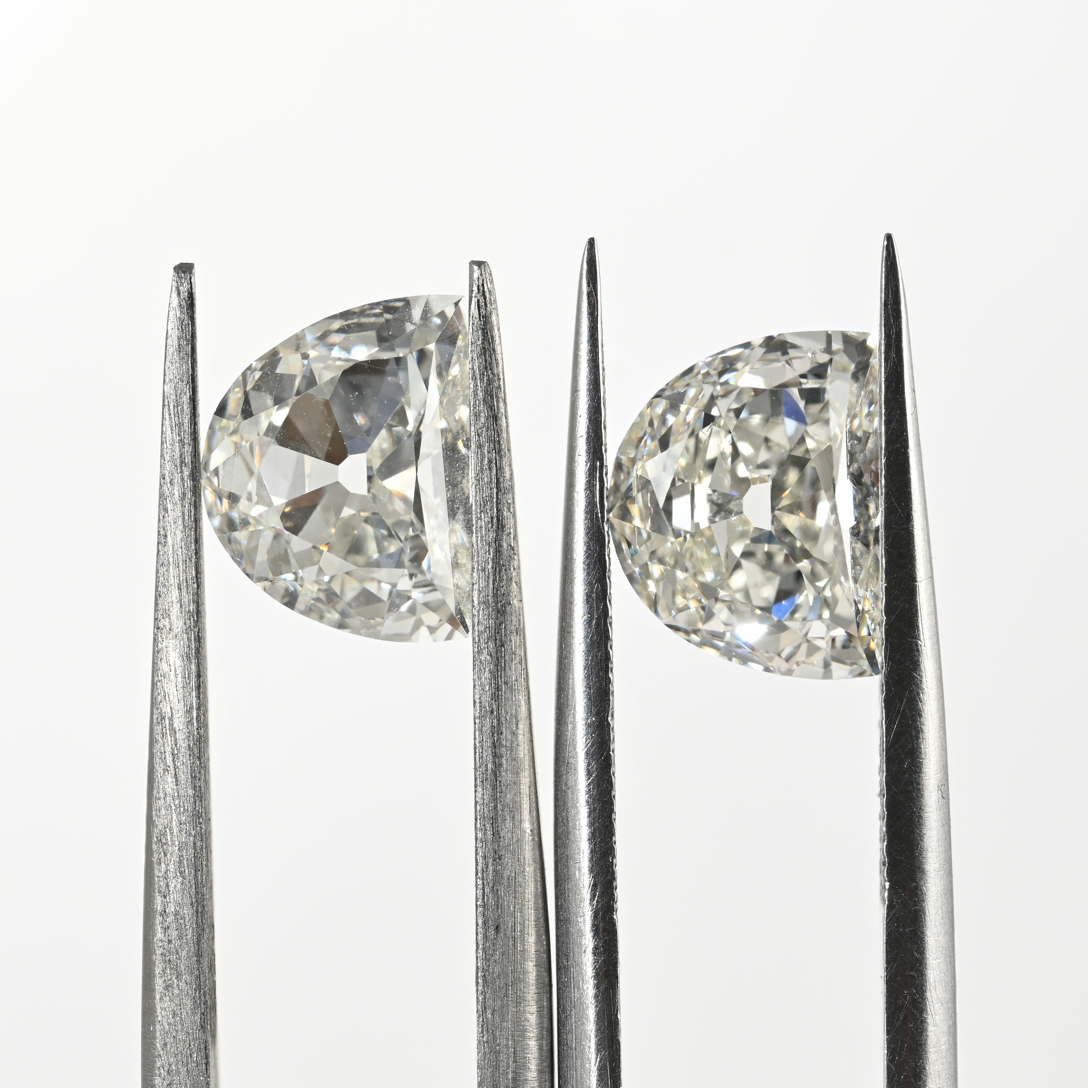 2.71 Carat Half Moon Shape Natural Diamonds Pair – H/I Color, SI1/SI1 Clarity