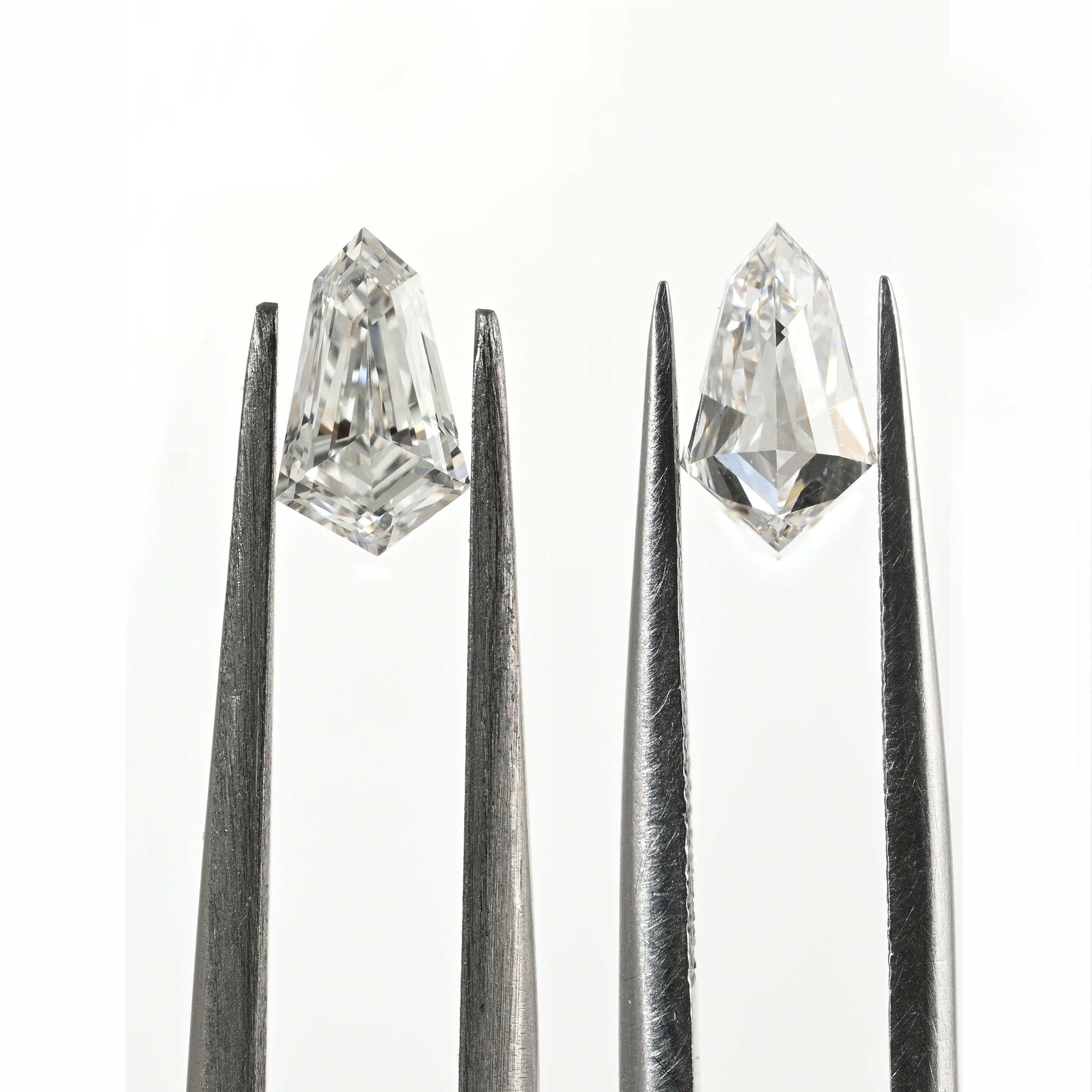 1.39 Carat Tie Shape Natural Diamonds Pair – E/F Color, VS1/SI1 Clarity