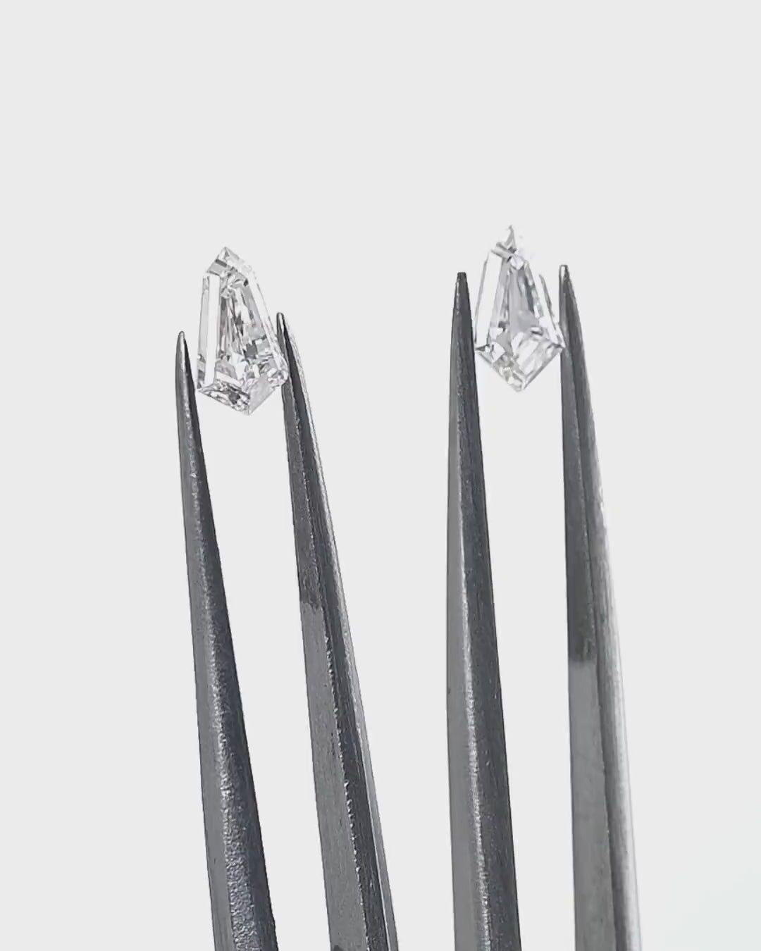 1.39 Carat Tie Shape Natural Diamonds Pair – E/F Color, VS1/SI1 Clarity